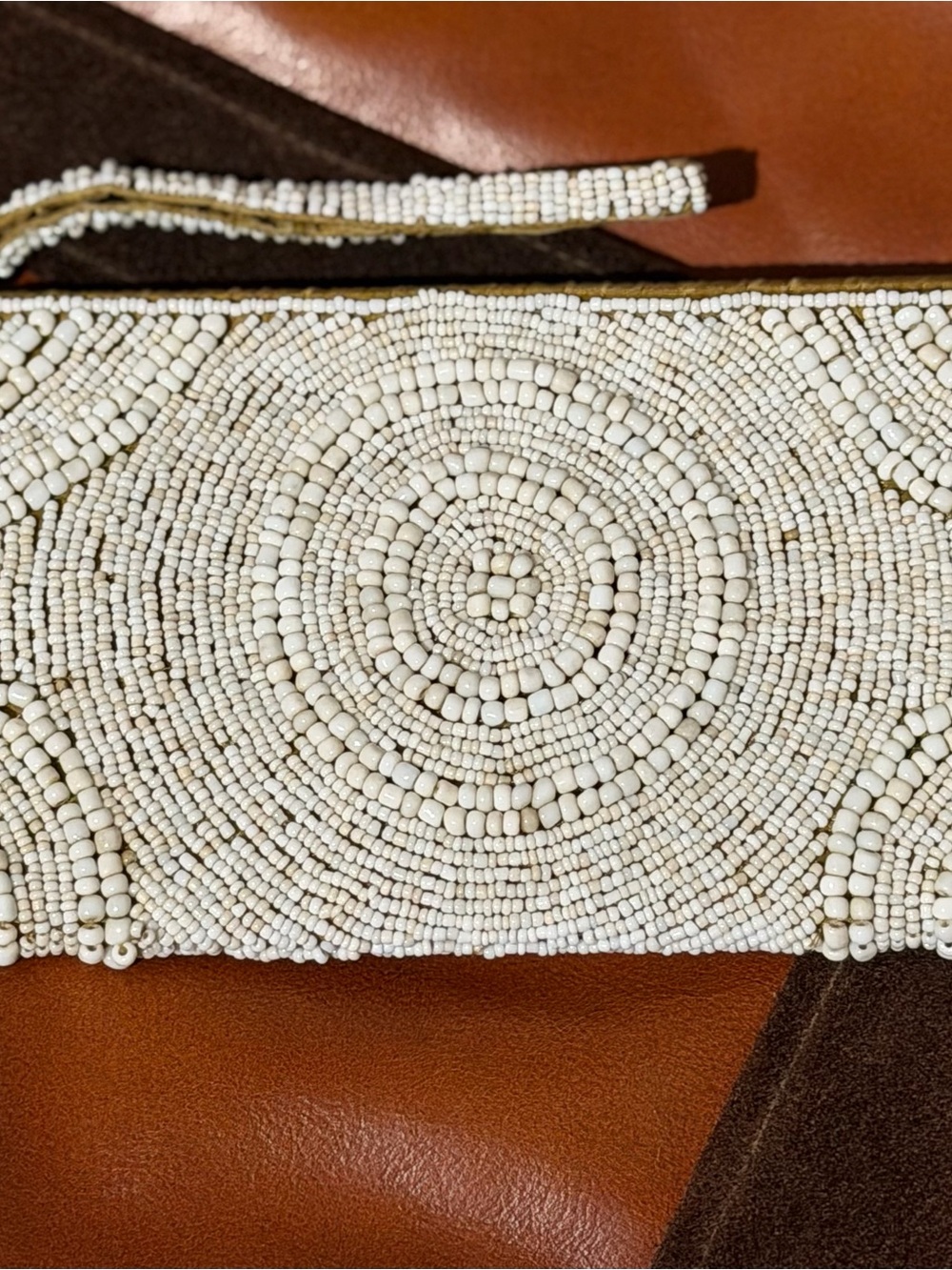 Tommy Bahama Cream Beaded Circular-Pattern Wristlet Clutch